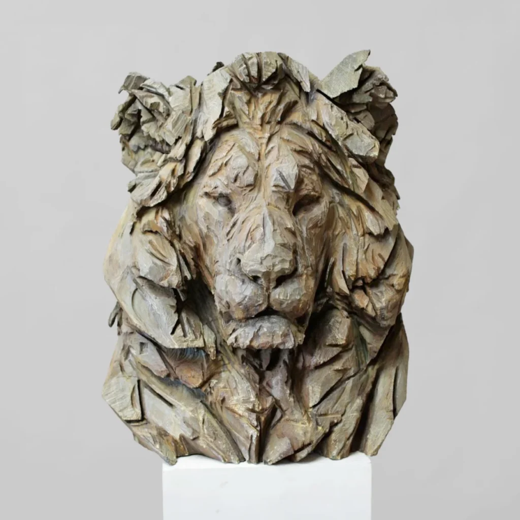 Sculpted lion head in layered metal exhibited by Galeries Bartoux on New Bond Street Sculpted lion head in layered metal exhibited by Galeries Bartoux on New Bond Street