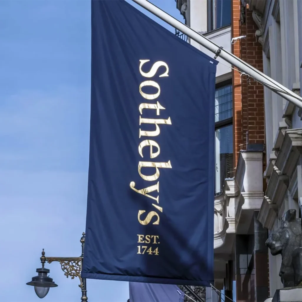 Mayfair in 2026: Where Luxury Money Actually Goes Sotheby's banner flying outside the auction house on New Bond Street in Mayfair