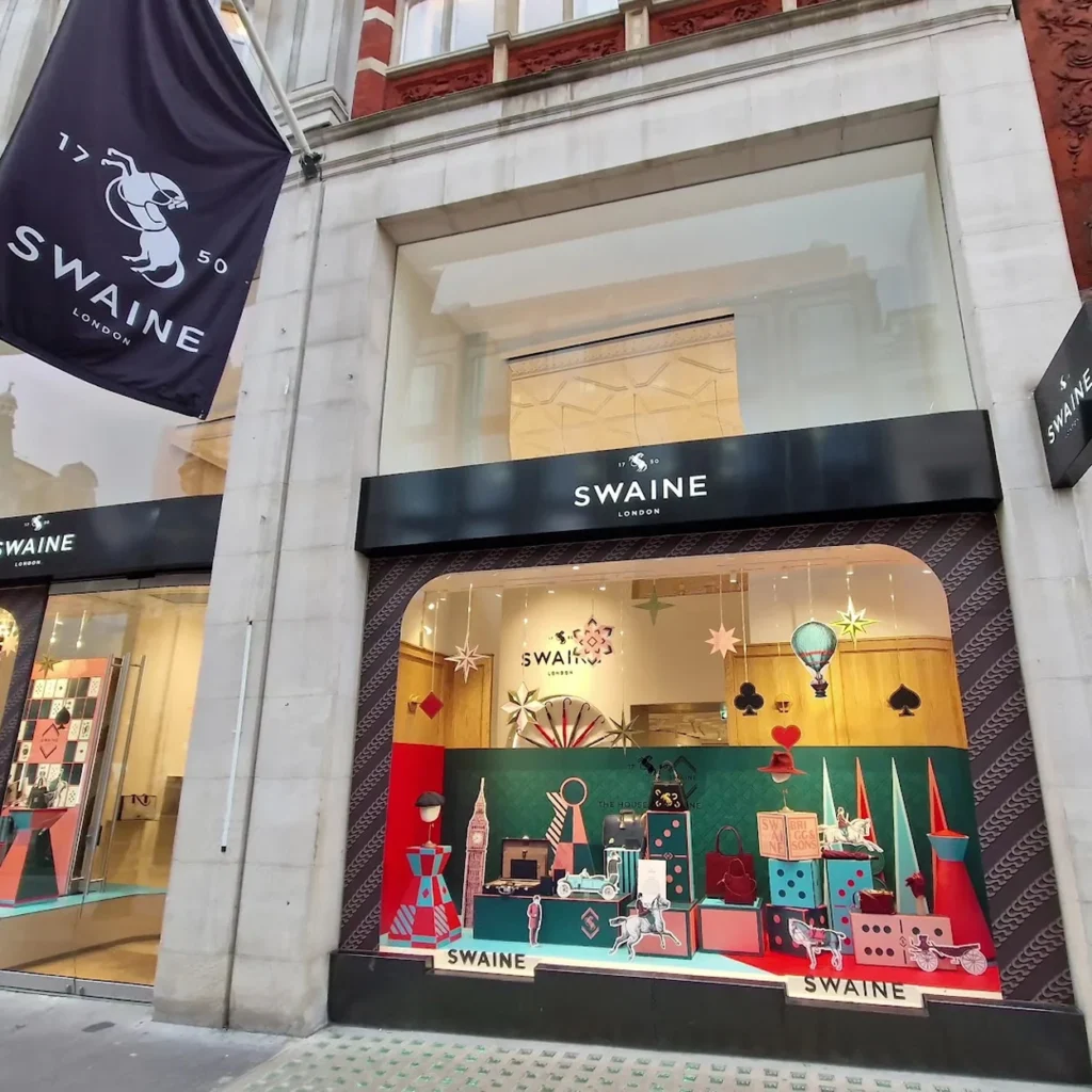 The Swaine shopfront on New Bond Street with its window display and signage The Swaine shopfront on New Bond Street with its window display and signage