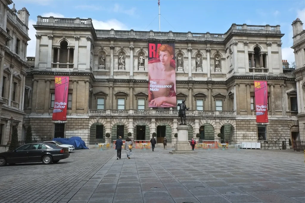 Royal Academy Exhibitions This Winter, Riviera and Cork Street Royal Academy of Arts at Burlington House, Piccadilly, seen across the Annenberg Courtyard by day with exhibition banners